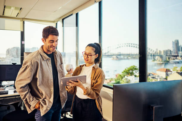 Our team at work with Sydney Harbour Bridge views